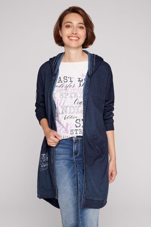 Lange Kapuzenjacke im Materialmix mit Prints