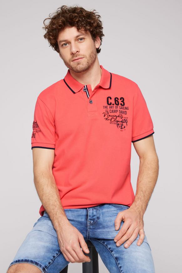 Pikee-Polo mit kleineren Artworks sunset red