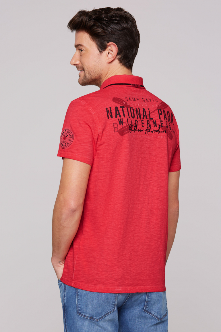 Poloshirt mit Label-Applikationen red orange