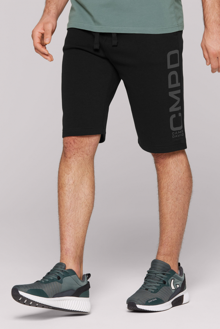 Sportshorts im tonalen Strukturmix mit Print black