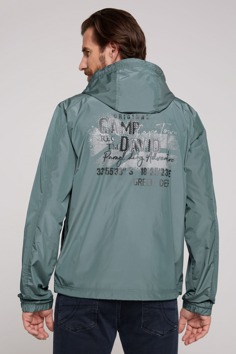 Windbreaker-Jacke mit Kapuze und Rückenprint teal