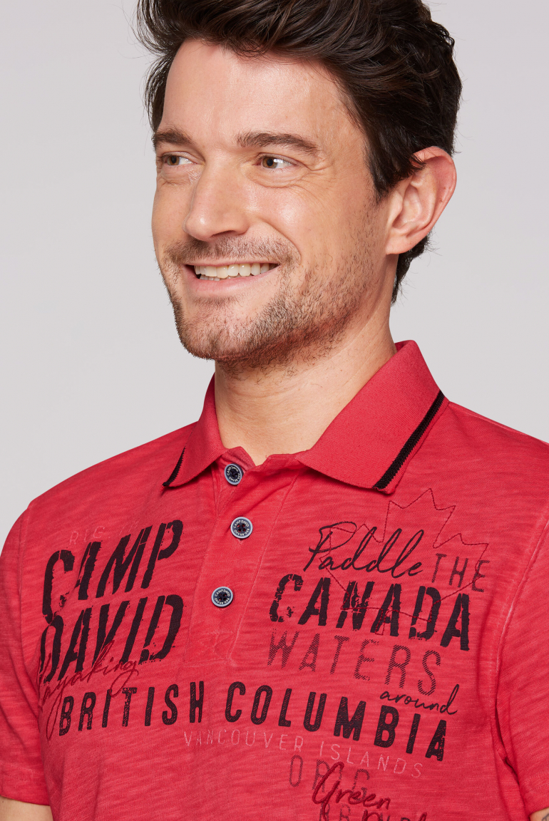 Poloshirt mit Label-Applikationen