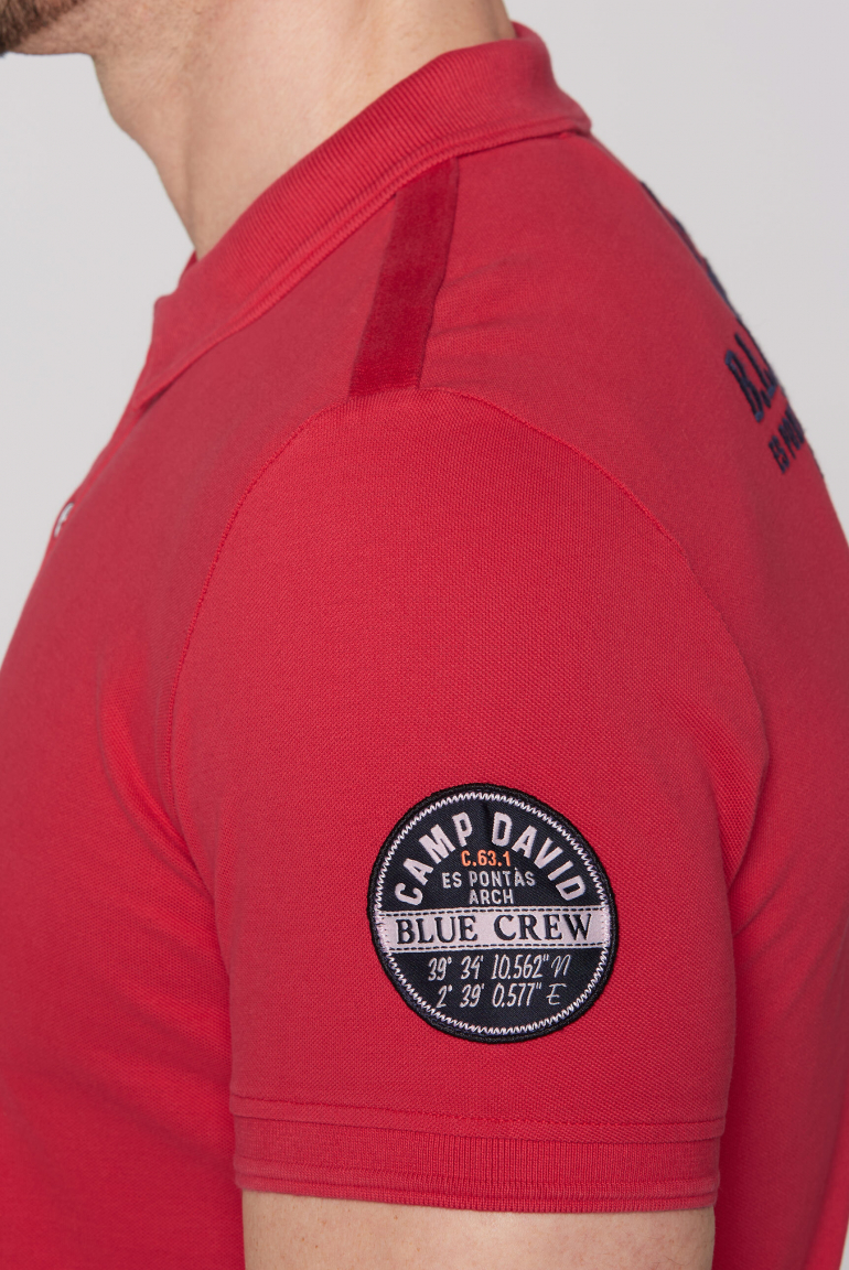 Pikee-Polo mit Logo-Stickereien