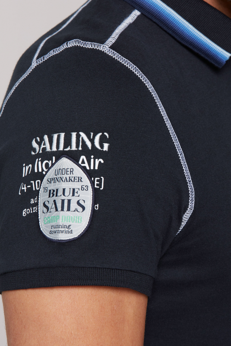 Poloshirt mit Logo-Applikationen