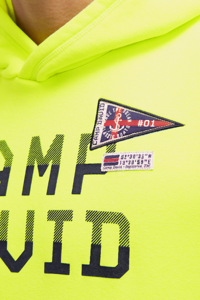 Hoodie mit Rubber Print und Tapes