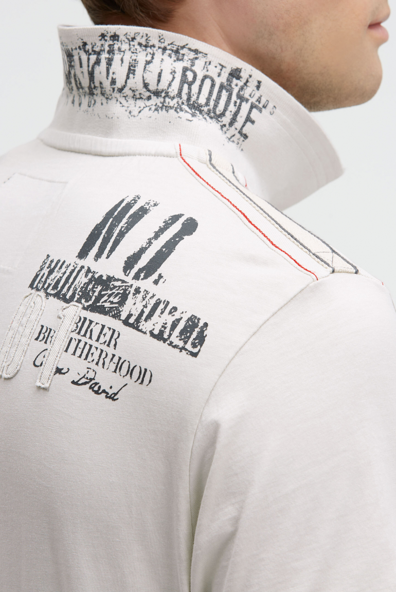 Kurzarmpolo mit Tapes und Logo-Applikationen