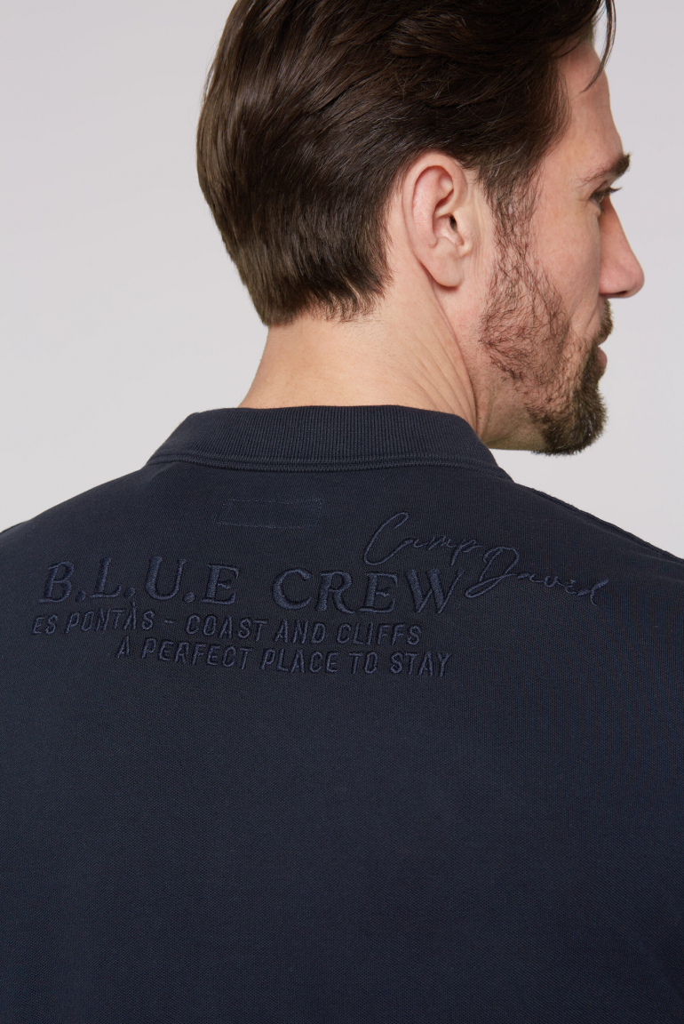 Pikee-Polo mit Logo-Stickereien