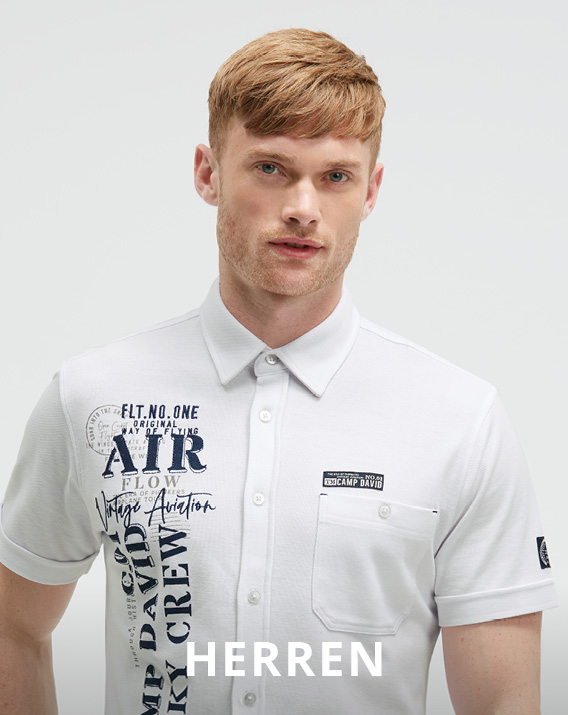 Model trägt gelbes Polo